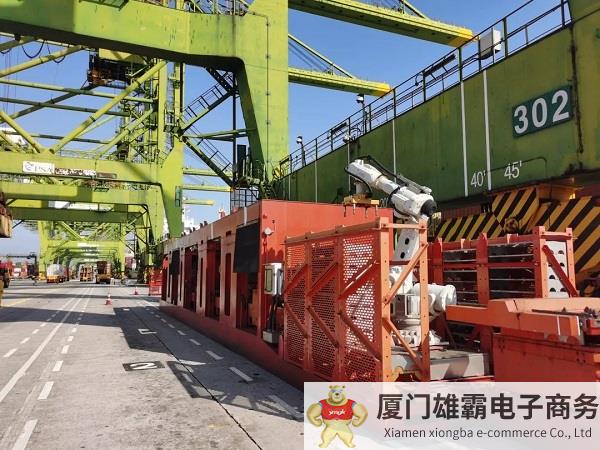 打通自动化码头作业“最后一公里”，世界首台自动拆装锁销机实现首次高效实船作业